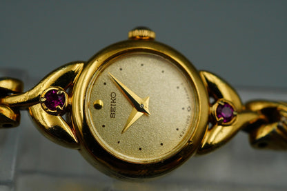 *NEAR MINT* Vintage SEIKO 1E20-0430 Quartz Gold Dial Round 15 mm Women Watch