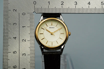 *MINT* Vintage 1996 SEIKO 7N01-6880 Quartz Gold Dial Round 25 mm Women Watch