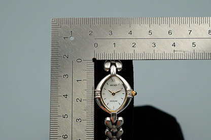 *NEAR MINT* Vintage SEIKO EXCELINE 1F20-6B60 Qz White Dial Oval 15 mm WomenWatch