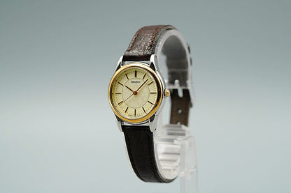 *MINT* Vintage 1996 SEIKO 7N01-6880 Quartz Gold Dial Round 25 mm Women Watch