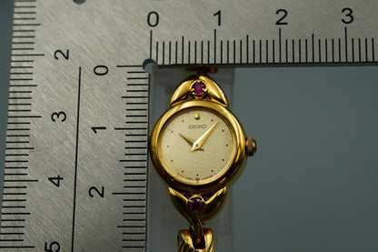 *NEAR MINT* Vintage SEIKO 1E20-0430 Quartz Gold Dial Round 15 mm Women Watch