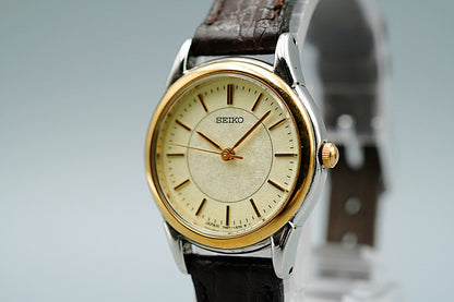*MINT* Vintage 1996 SEIKO 7N01-6880 Quartz Gold Dial Round 25 mm Women Watch